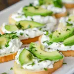Homemade Canapes with Garlic Herb Cream Cheese and Avocado photo
