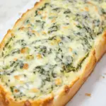 Homemade Cheesy Spinach Artichoke Bread photo