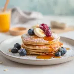 Homemade Fluffy blueberry & banana pancakes with oats photo