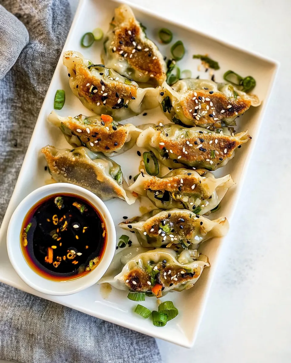 delicious Homemade Vegetable Potstickers with Toasted Sesame Honey Soy Sauce. shot
