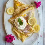 Homemade Lemon Sugar Crepes with Whipped Cream Cheese. photo