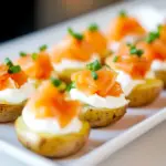 Homemade Mini Baked Potatoes with Sour Cream and Smoked Salmon photo
