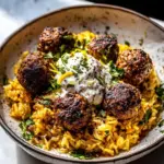 Homemade One Skillet Greek Meatballs and Lemon Rice. photo