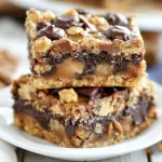 Homemade Peanut Butter Snickers Cookie Bars photo