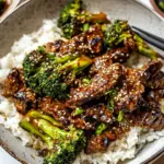 homemade Sheet Pan Spicy Ginger Sesame Beef and Broccoli. photo