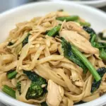 Homemade Thai-Style Stir-Fried Noodles with Chicken and Broccolini photo